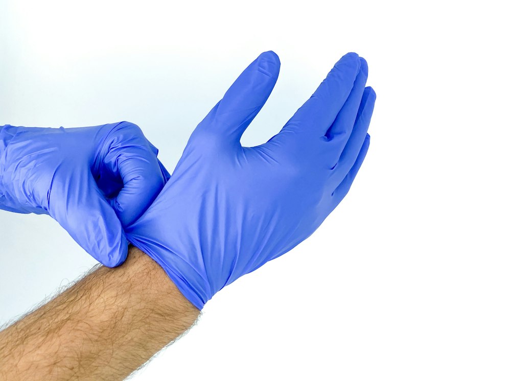 Blue nitrile examination gloves