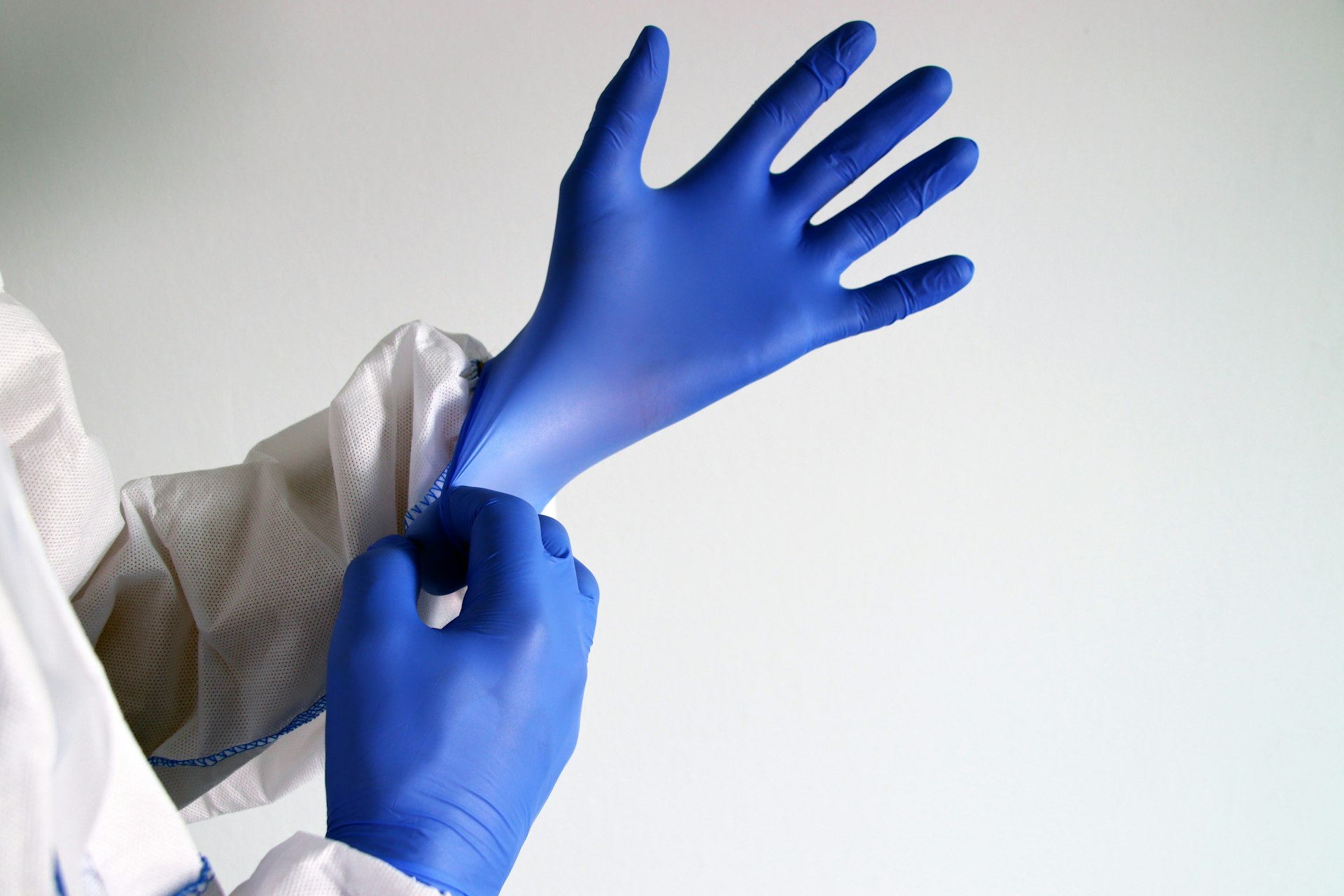 Blue nitrile medical examination gloves